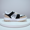 Men’s beige and black casual sneakers for daily wear